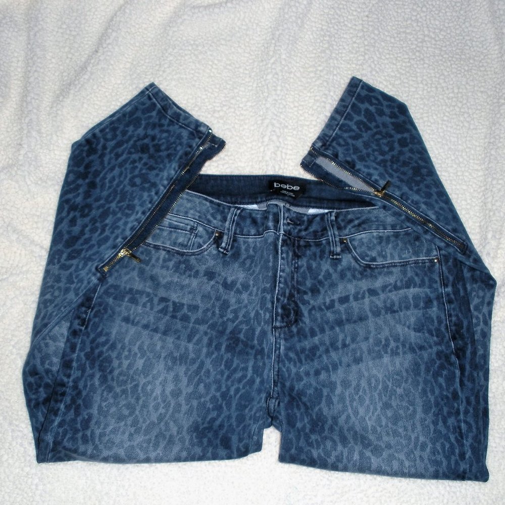 BEBE Dark wash fade leopard print ankle zip straight leg jeans